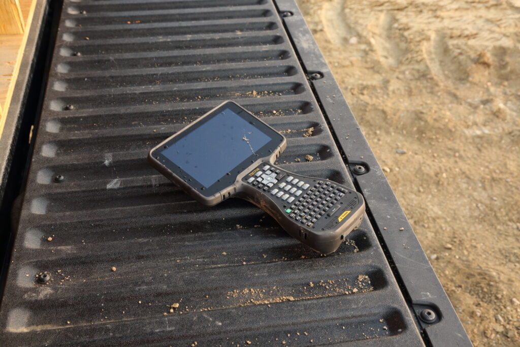 Trimble TSC710 controller running site positioning software for efficient construction surveying workflows.